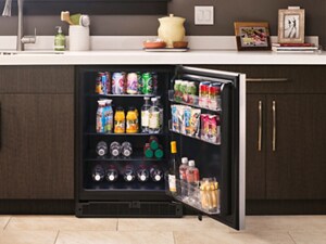A beverage center filled with drinks and small snacks