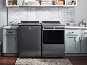 A Whirlpool® Washer and Dryer pair in a laundry area