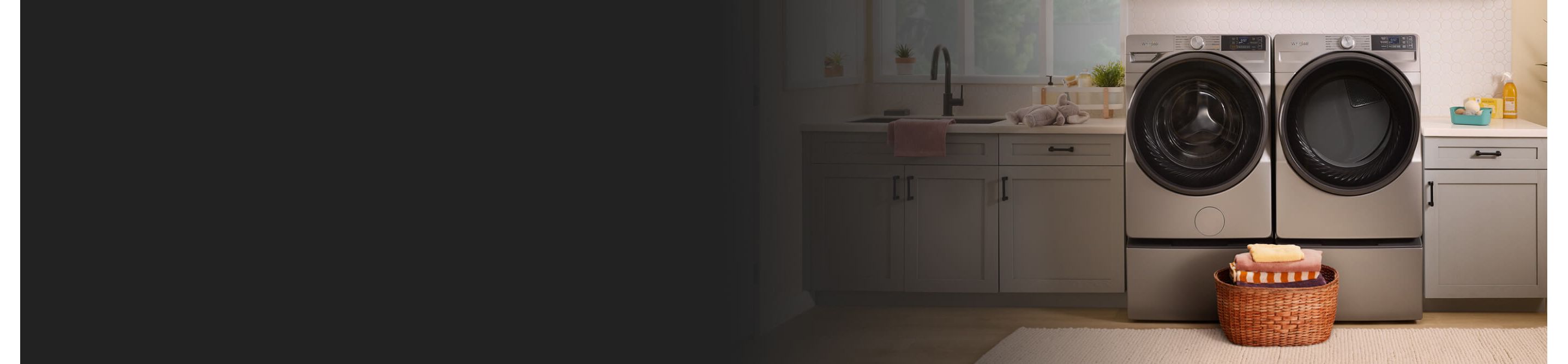 A Whirlpool® washer and dryer pair in a laundry room