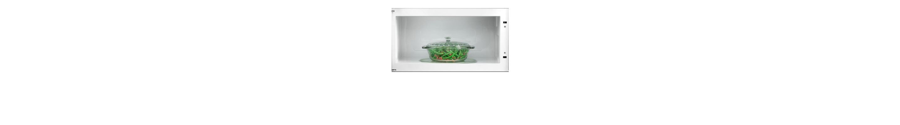A container of green beans inside a microwave.