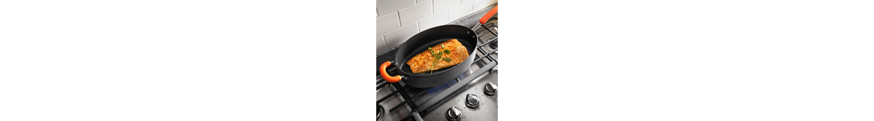 Food cooking in a pan on a stovetop