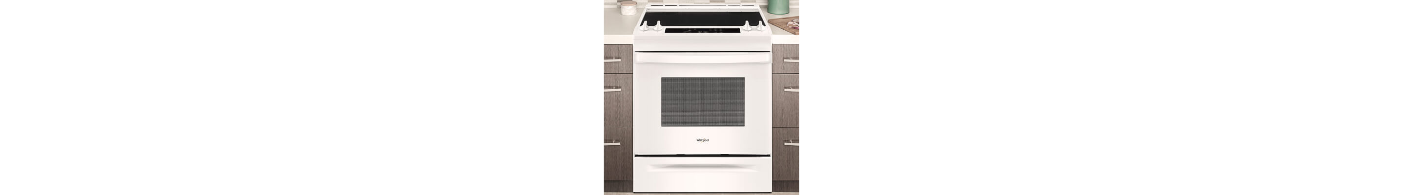 White Whirlpool® range set in cabinetry
