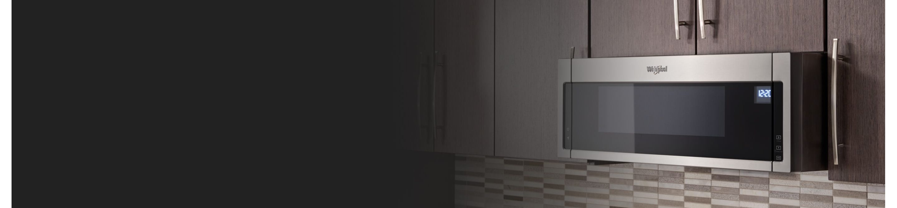 Stainless, Whirlpool® Over-The-Range Microwave in brown cabinetry