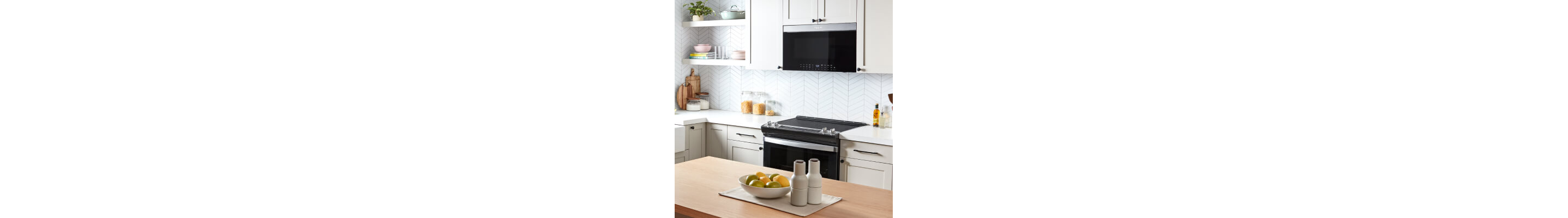 A microwave mounted above a range
