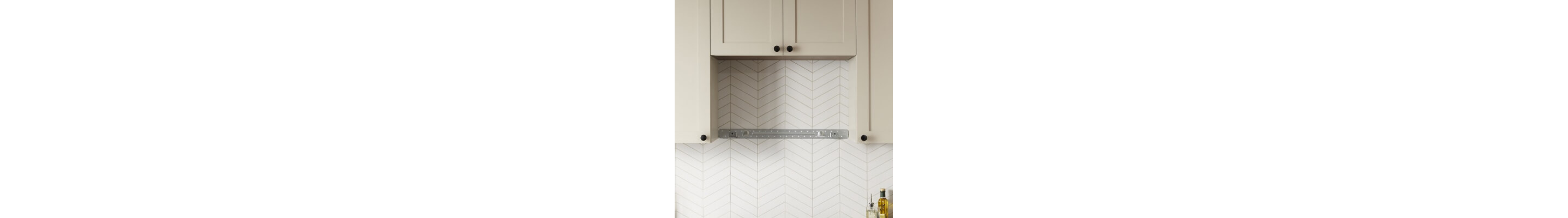 A blank space on a wall where a microwave could be installed