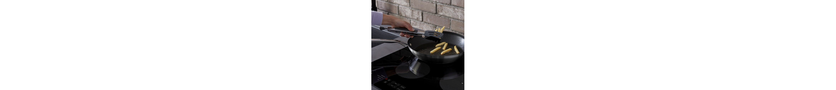 French fries being cooked on an electric stovetop