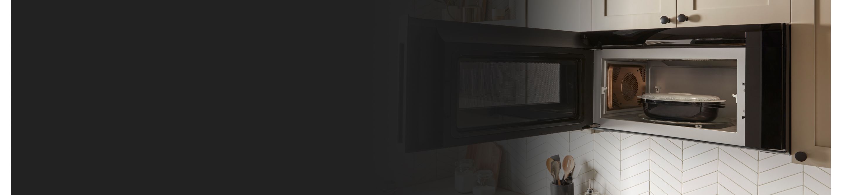 Whirlpool® microwave open to show contents