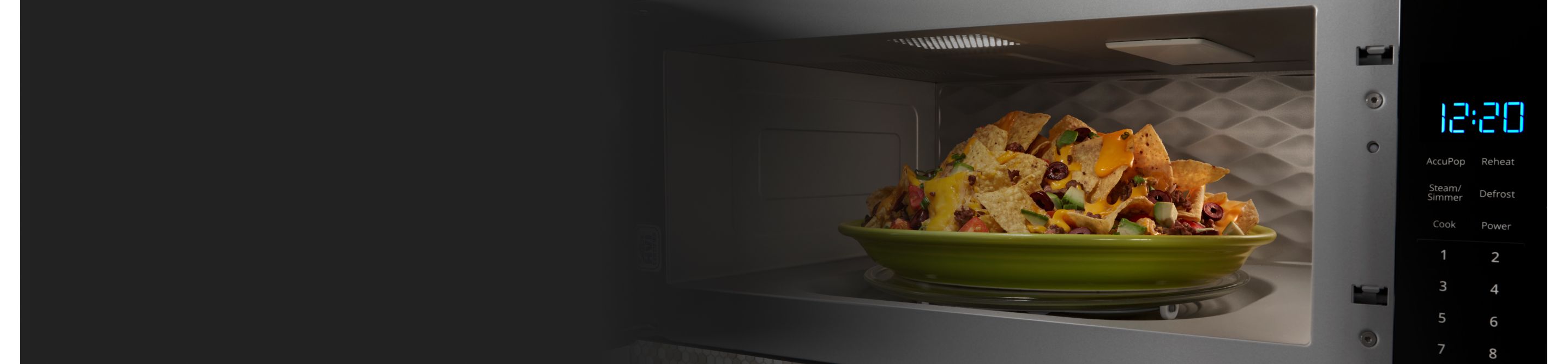 A plate of nachos in the microwave