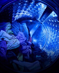 The inside of a washing machine with UV light