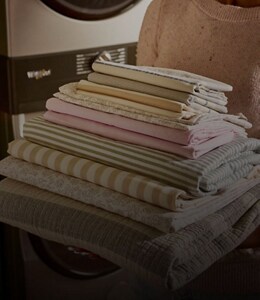 A pile of laundry sheets and pillowcases